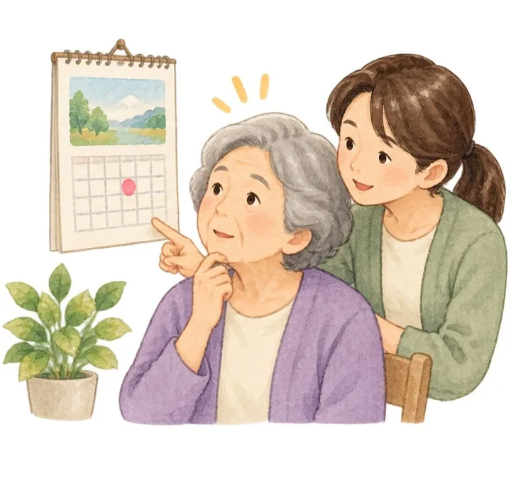 スタッフと予定確認する女性
